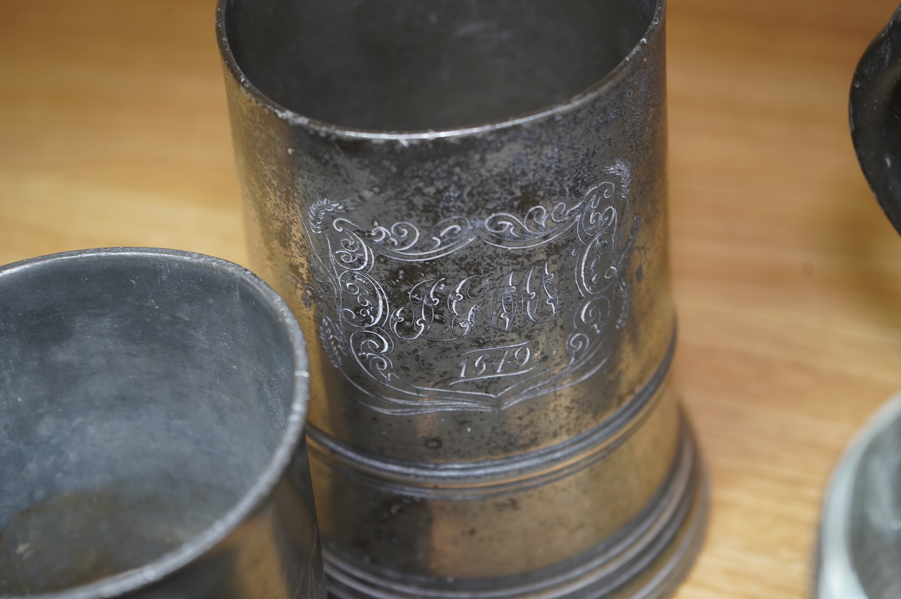 A collection of various pewter tankards, jugs etc. Condition - varies